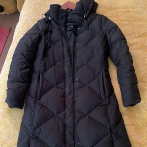 North face dawn coat black just above knee bought in new a free item w/ purchase